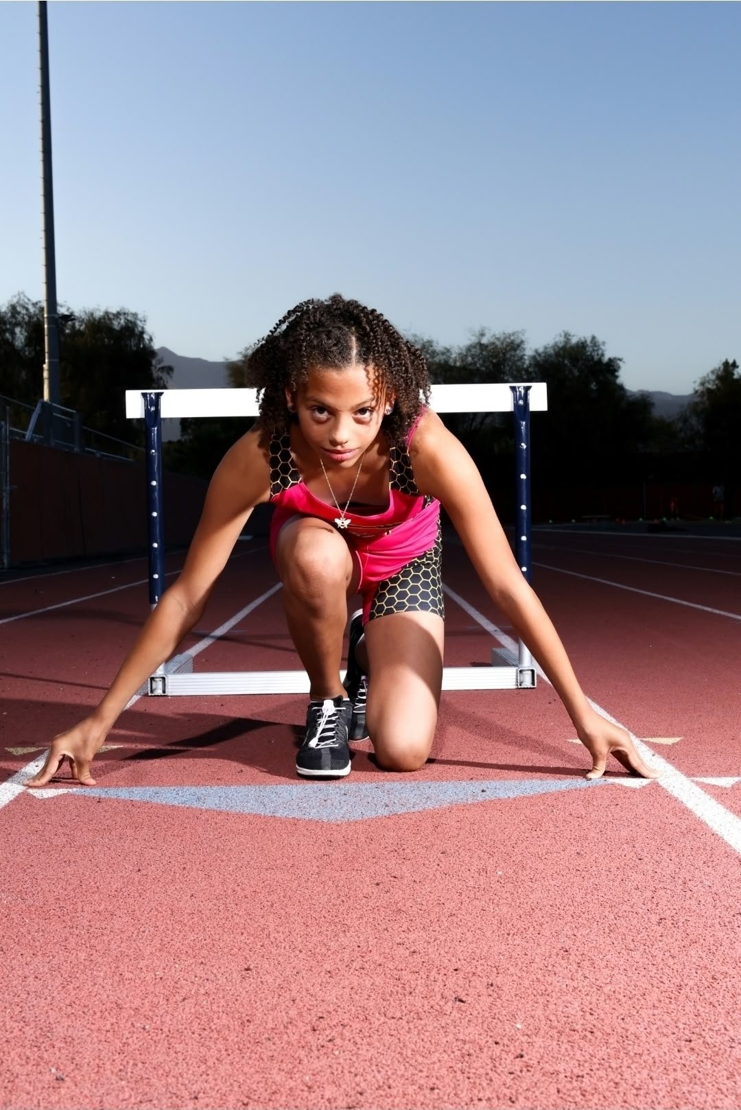 Ali at a track starting line